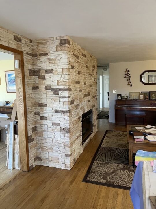 Vanilla Bean Stacked Stone living room fireplace accent wall