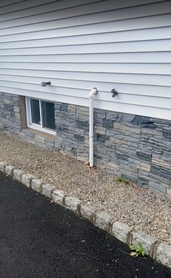 A DIY exterior skirting project that uses Northern Slate faux stone.