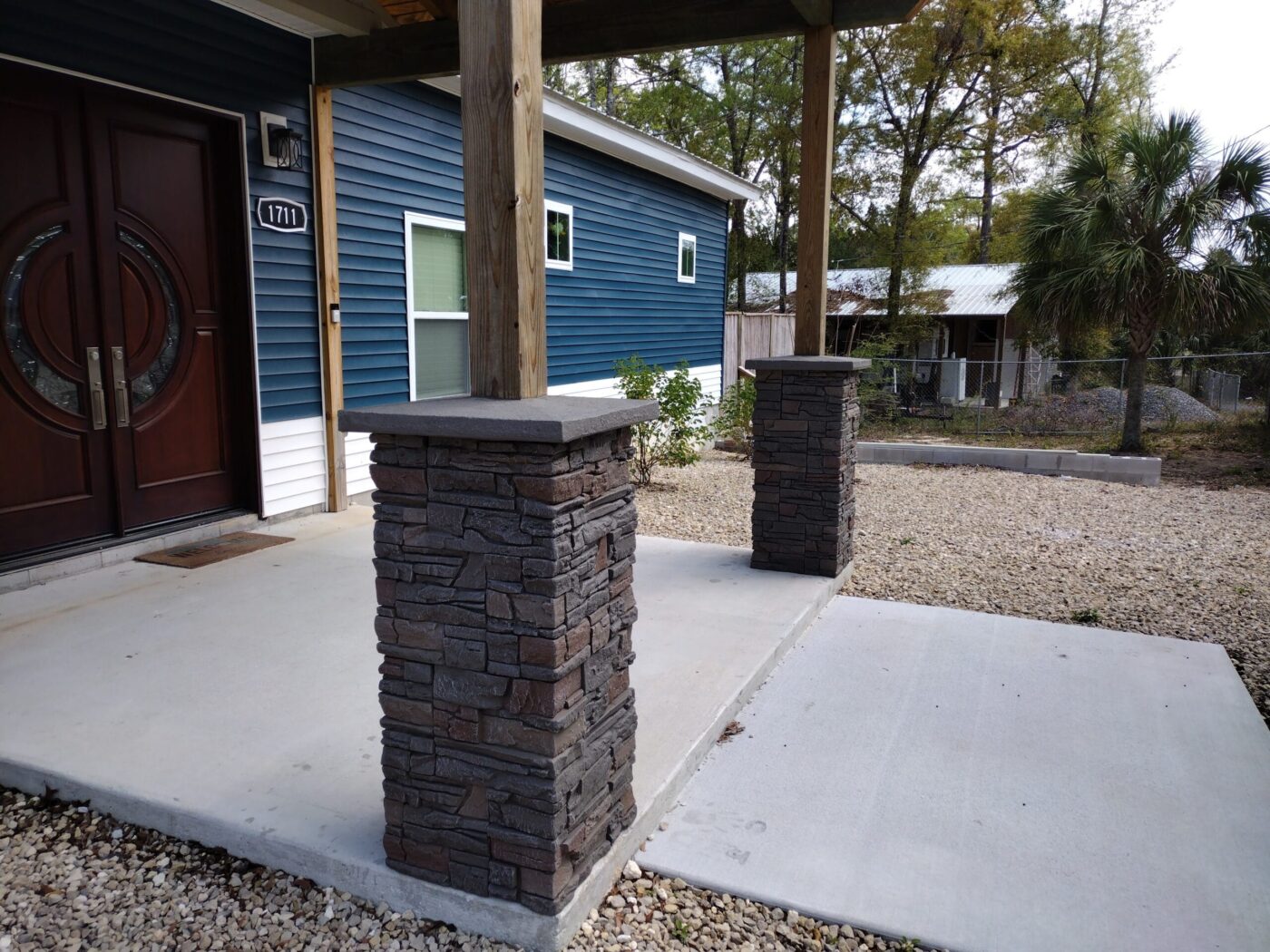 Home exterior columns made with GenStone's Stratford Faux Stone.