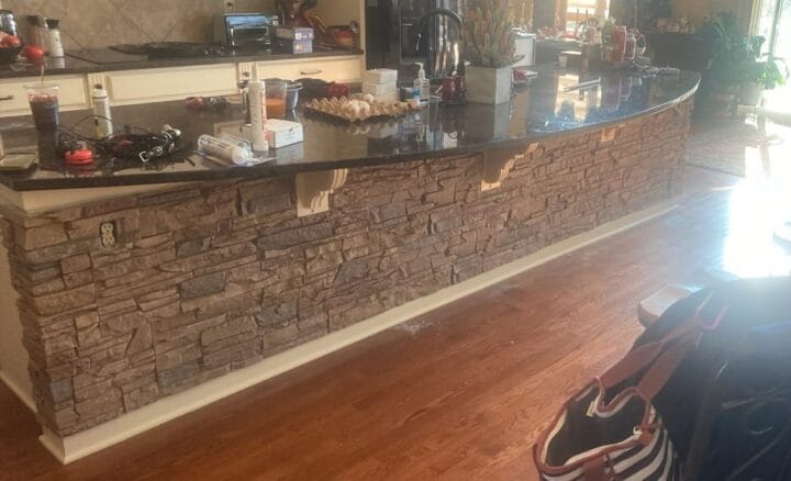 A DIY breakfast bar using GenStone's Desert Sunrise Stone Veneer panels.