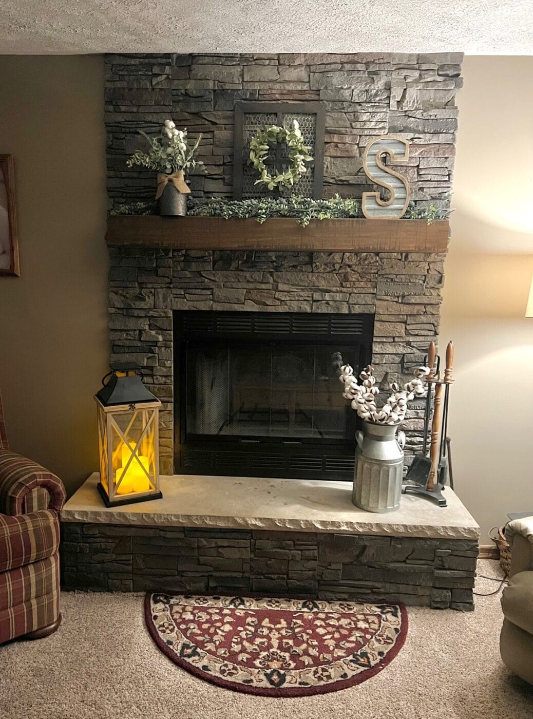 A DIY fireplace surround idea that was brought to life using GenStone's Kenai Stacked Stone panels.