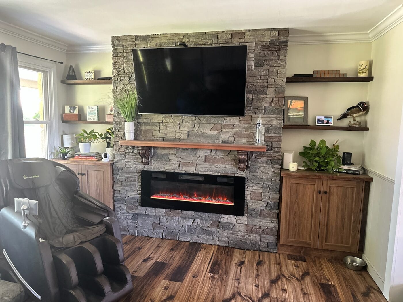 A DIY linear fireplace surround made using GenStone's Kenai Stacked Stone panels!