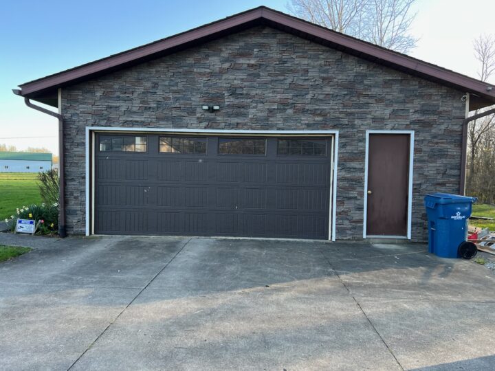 A DIY garage siding project made using GenStone's Kenai faux stone.