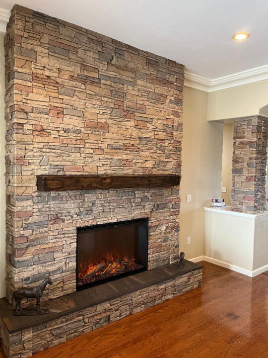 A DIY columns and fireplace surround project using GenStone's Desert Sunrise faux stone panels.