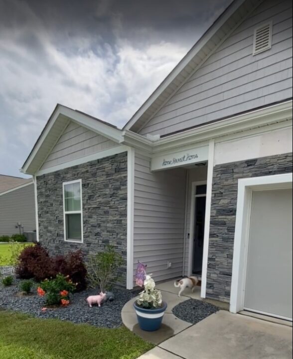 An easy DIY home siding project that uses GenStone's Northern Slate Faux Stone panels.