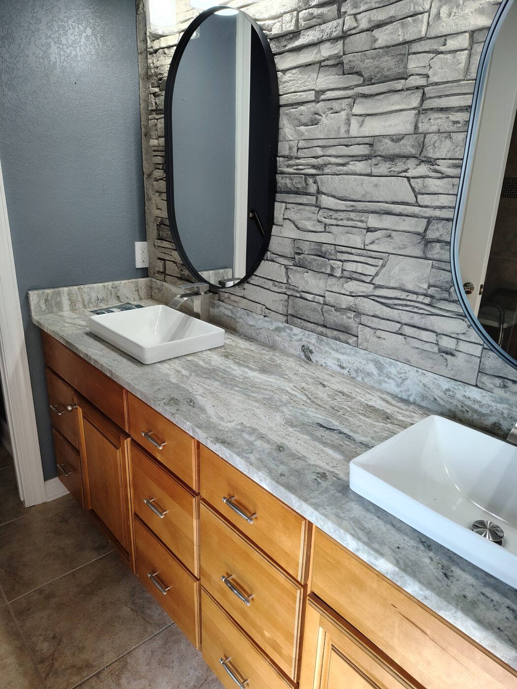 Al decided to make his bathroom his oasis using GenStone's Arctic Smoke Stacked Stone panels.