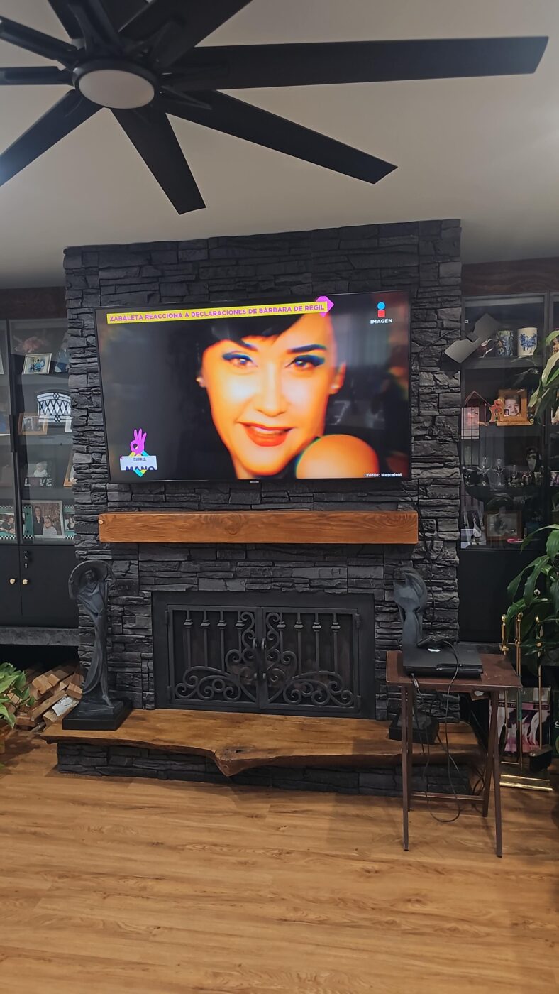 Alfredo used the power of GenStone to create a beautiful DIY faux black stone fireplace.