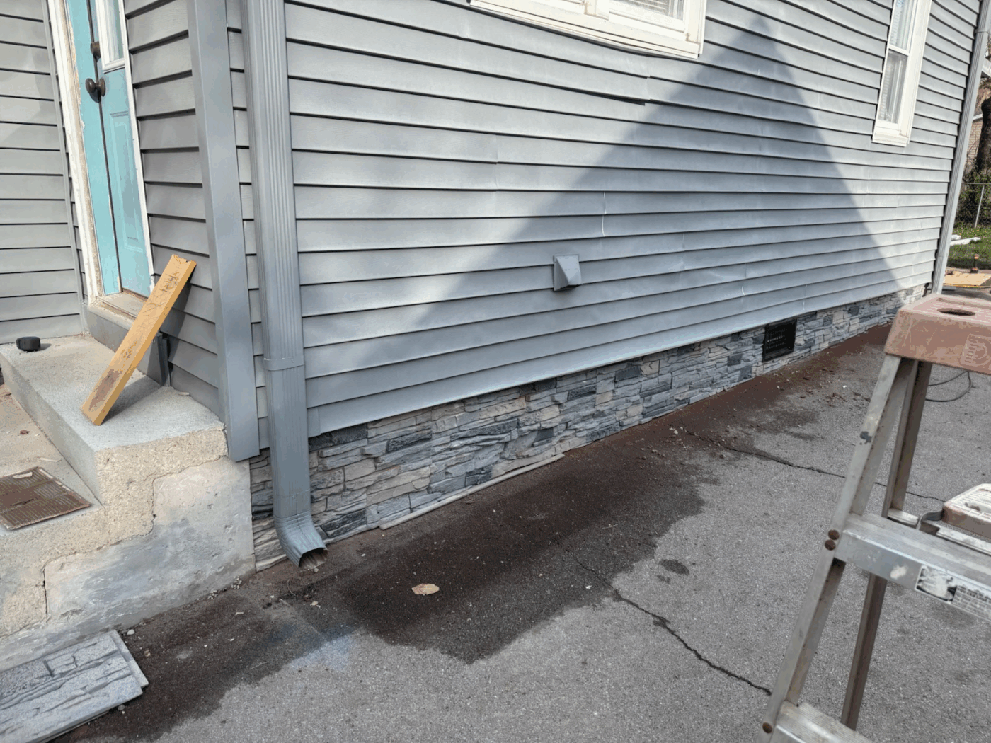 Jace completed a slate foundation cover using GenStone's Northern Slate Stacked Stone panels.