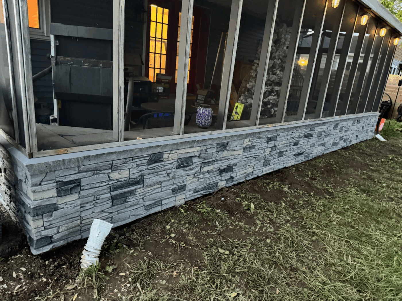 Jace completed a slate foundation cover using GenStone's Northern Slate Stacked Stone panels.