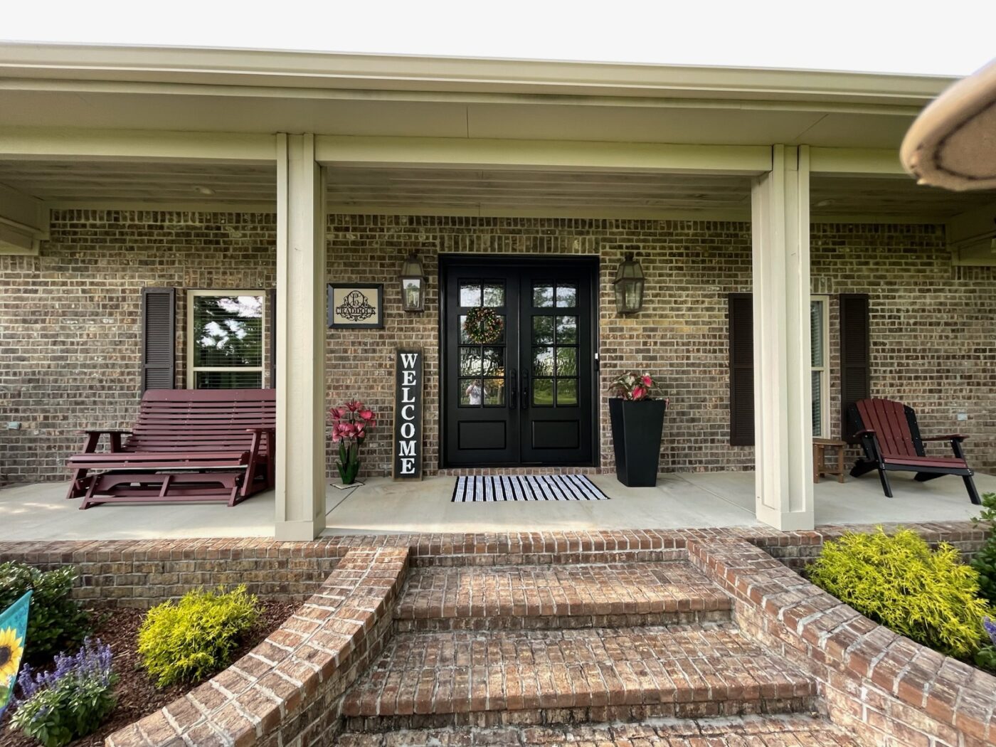 Before Marcia used GenStone's Desert Sunrise Stacked Stone Pillar panels to create imitation rock pillars for her home exterior.