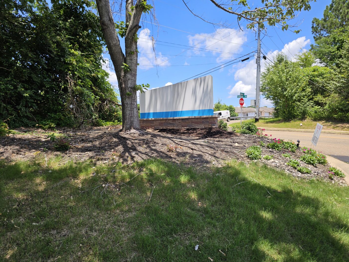 The back of the NA signs signage foundation that uses GenStone's Desert Sunrise Stacked Stone panels.