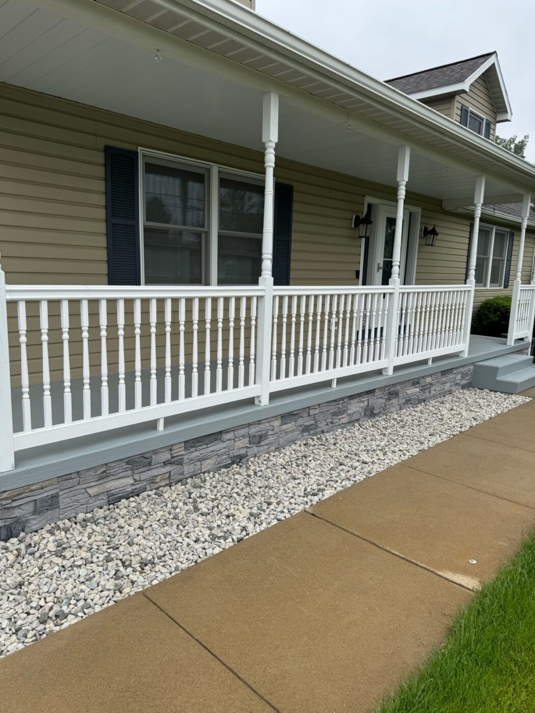 Todd used GenStone's Northern Slate Stacked Stone panels for a grey slate foundation cover for his home.