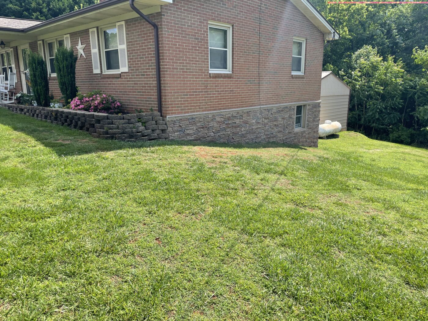 This is a home that GenStone's Desert Sunrise Stacked Stone panels were used on for a gray slate foundation cover up project.