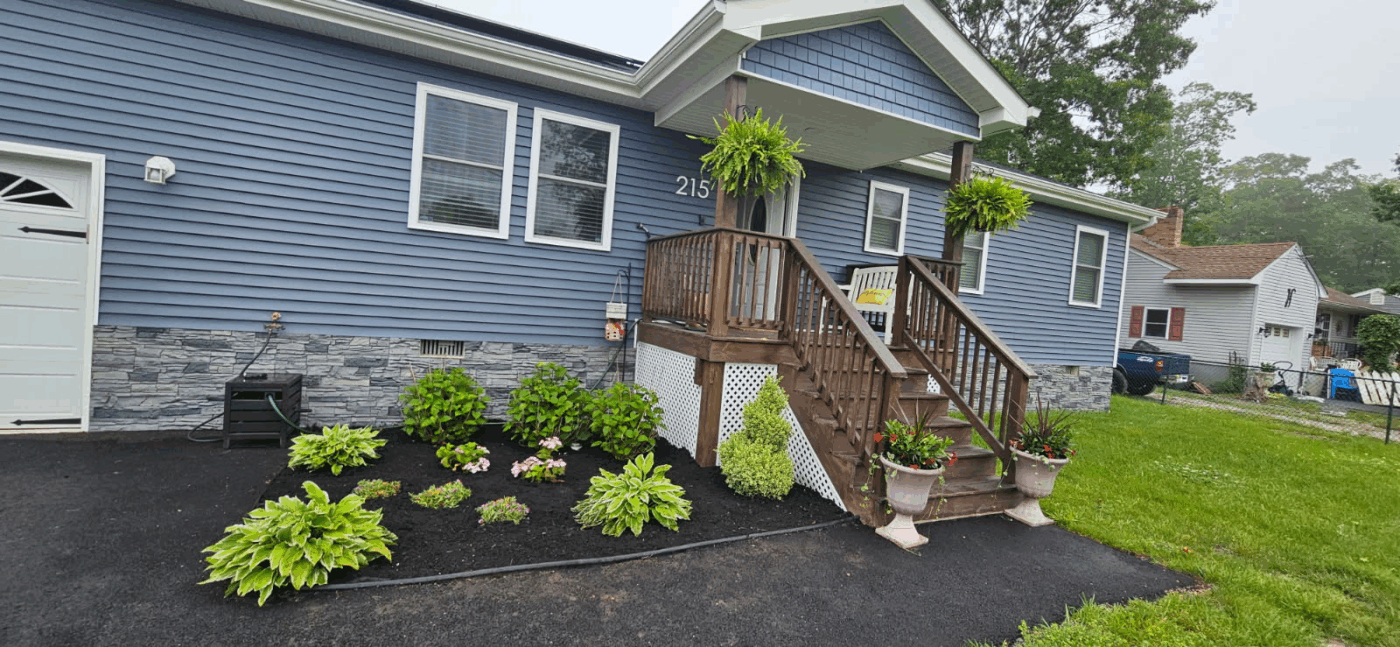 This home exterior is before the creation of a DIY slate foundation cover that uses with GenStone's Northern Slate Stacked Stone.