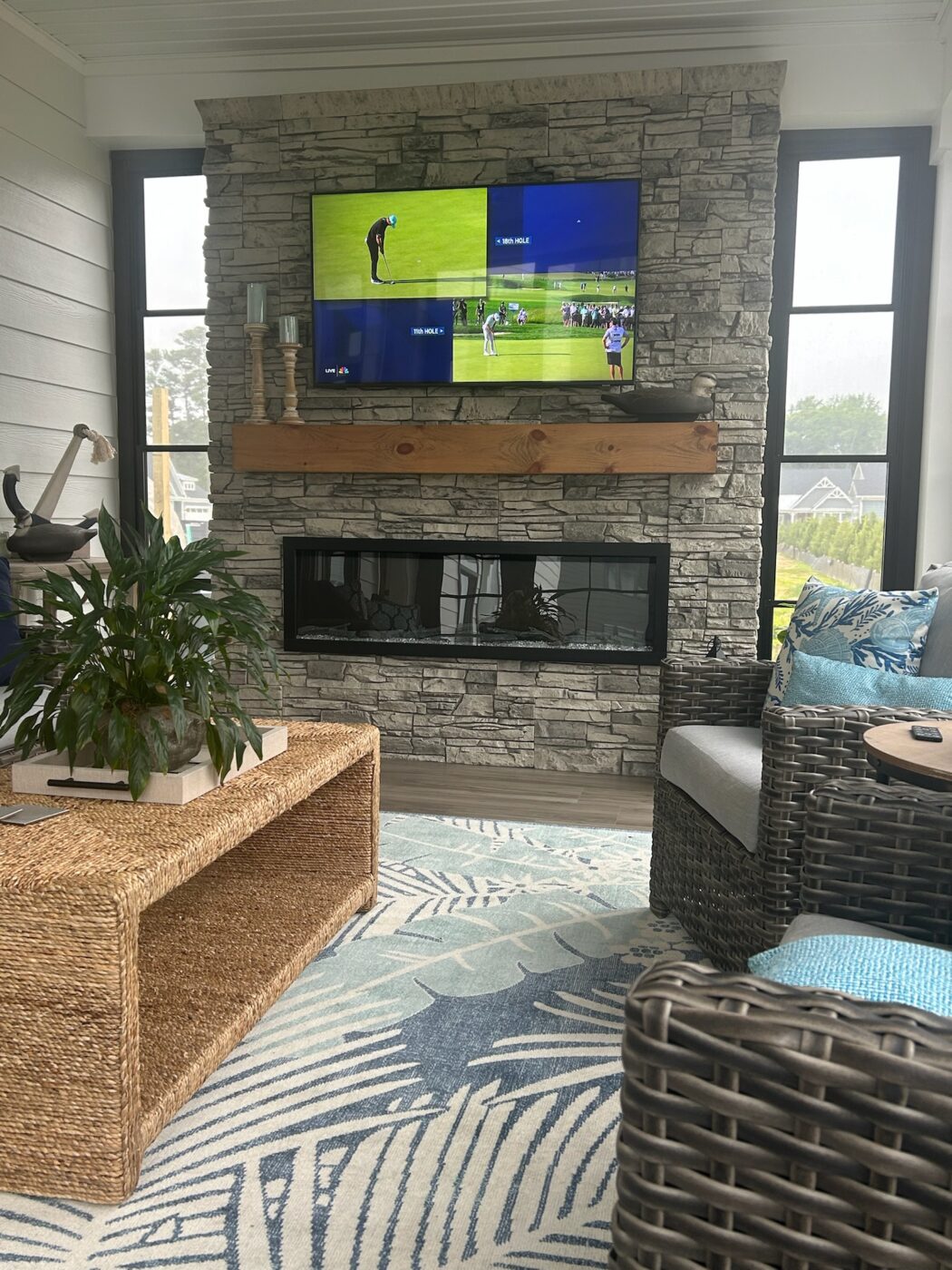 Kenny used GenStone's Arctic Smoke Stacked Stone panels to create a DIY faux stone fireplace surround in his living room.