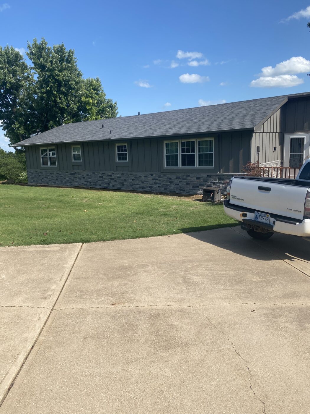 This home has a DIY slate wainscot that was created using GenStone's Northern Slate Stacked Stone panels.