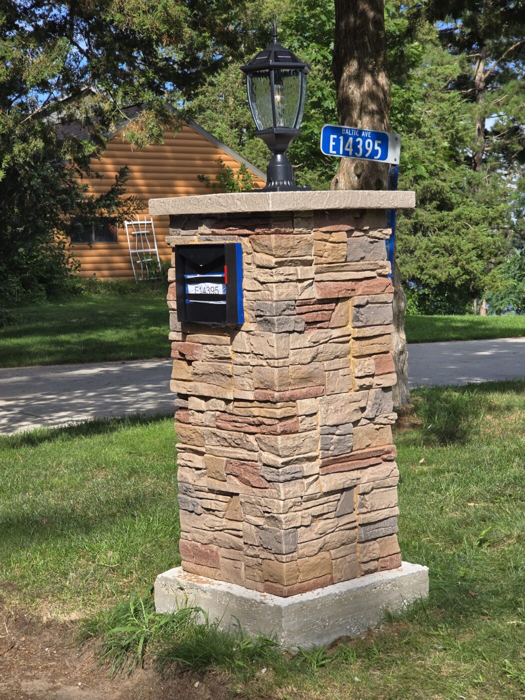 Enhance your curb appeal with a Desert Sunrise stone mailbox that adds texture, warmth, and architectural detail using easy-to-install GenStone panels.