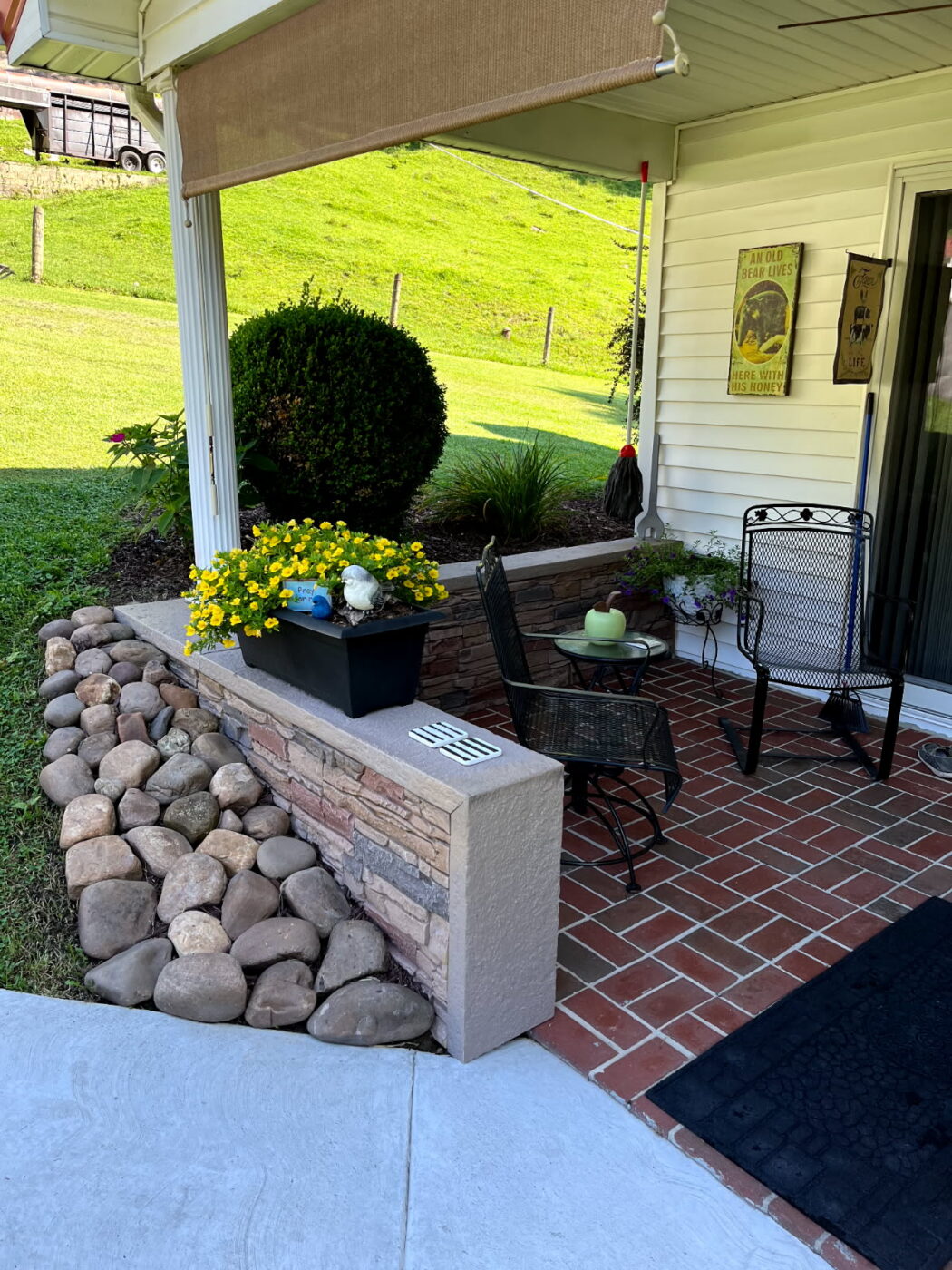 Upgrade your patio with a Desert Sunrise stone retaining wall that follows ground slopes easily using lightweight GenStone panels.