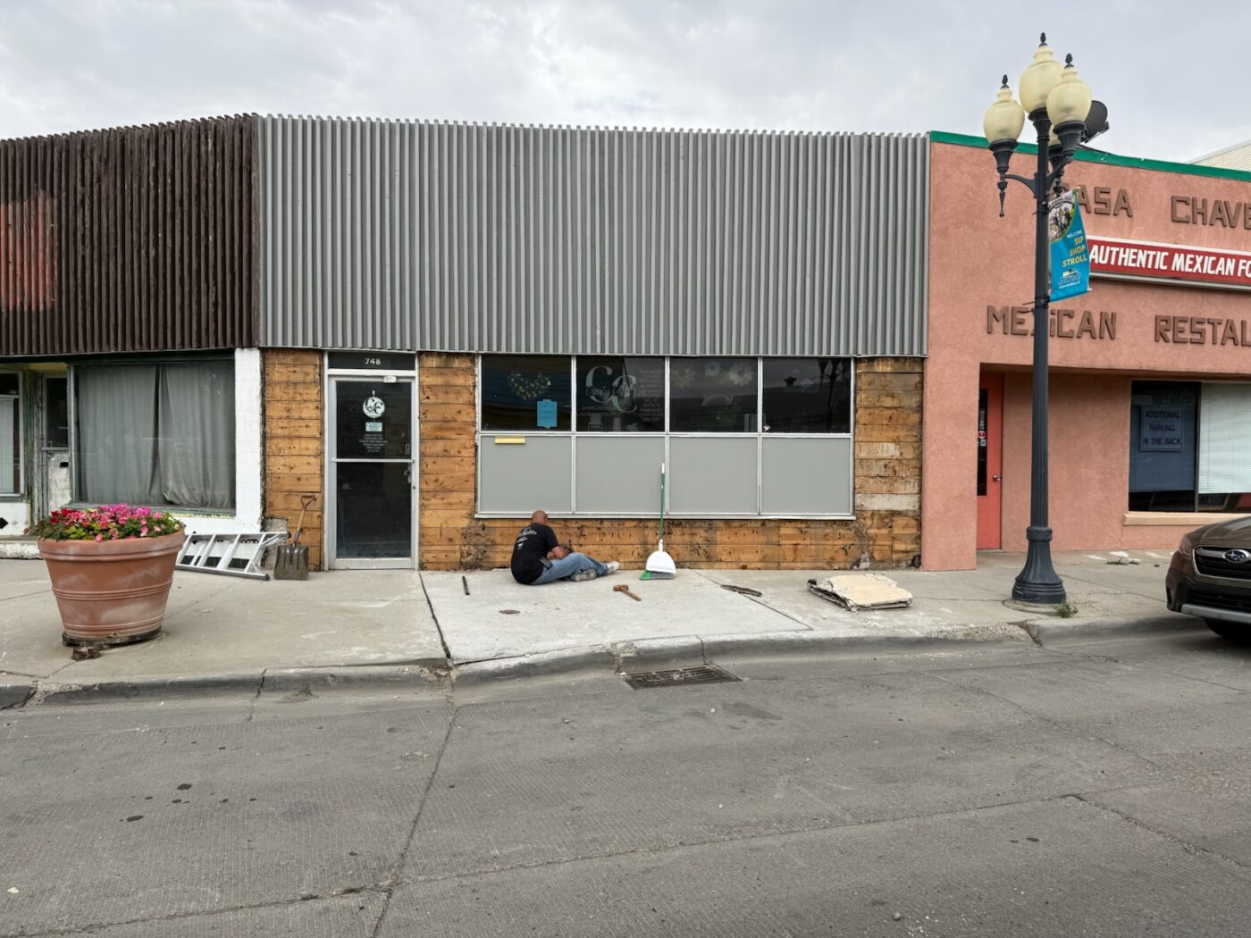 Before this building's exterior siding was upgraded using GenStone's Northern Slate Faux Stone panels.