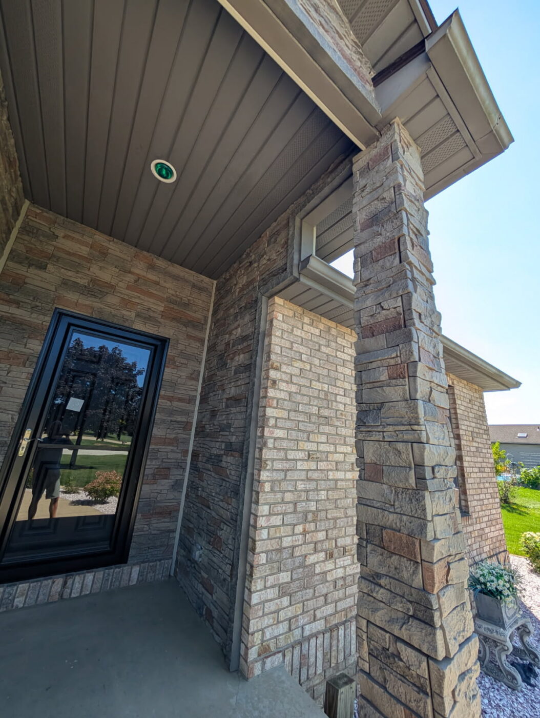 Frame your entry with a Kenai stone door surround to add depth, contrast, and a more defined, welcoming focal point.