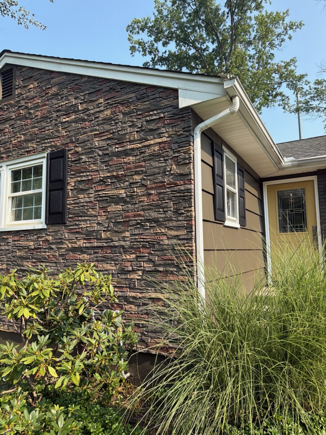 Stacked stone ranch house corner