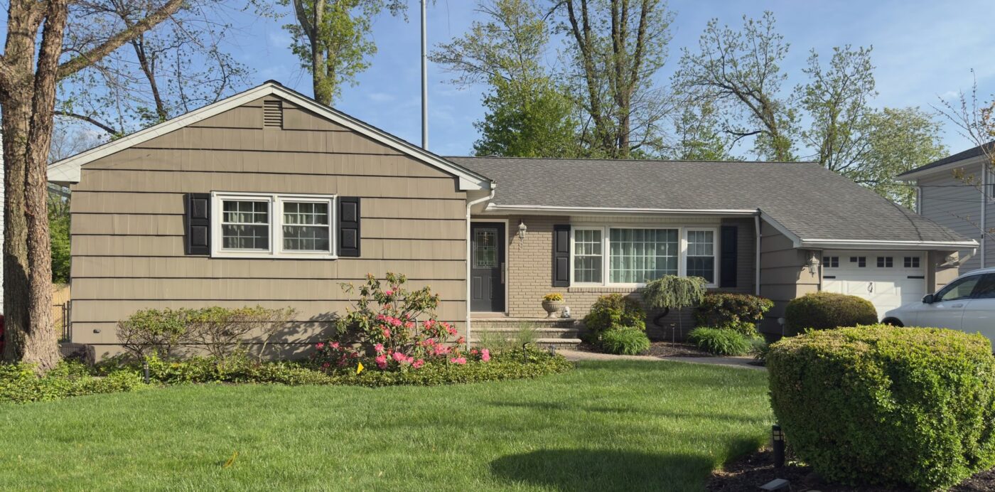 Stacked stone ranch house before