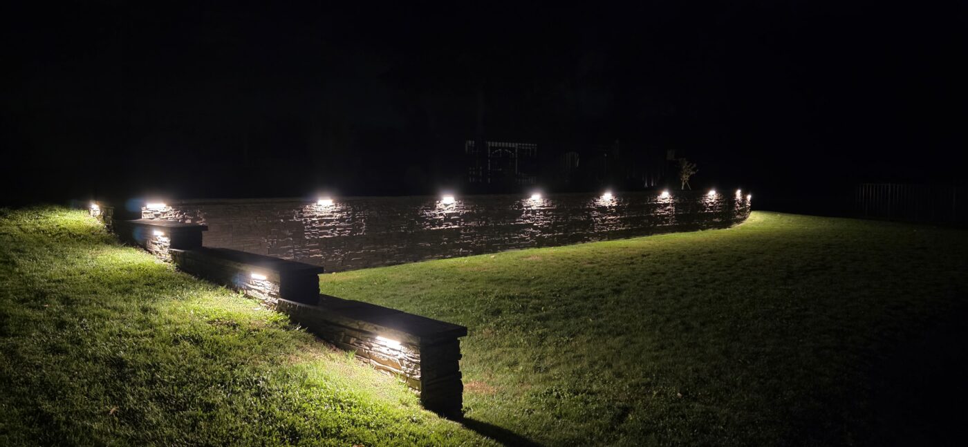 Coffee stacked stone retaining wall night lights