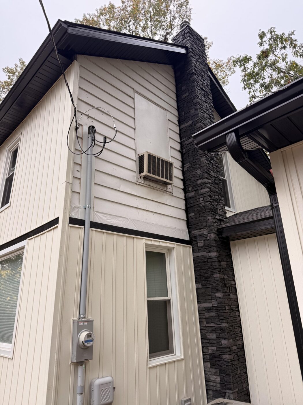 Iron Ore stone veneer chimney