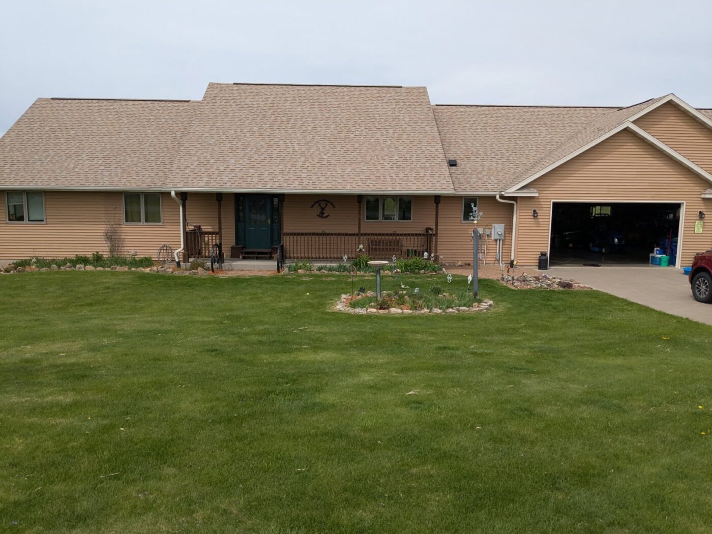Ranch home exterior before stone wainscot