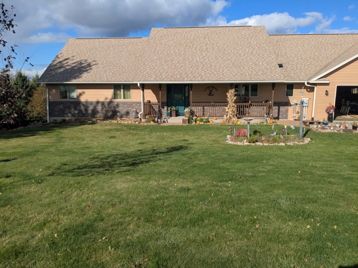 Stratford stone wainscot exterior ranch home